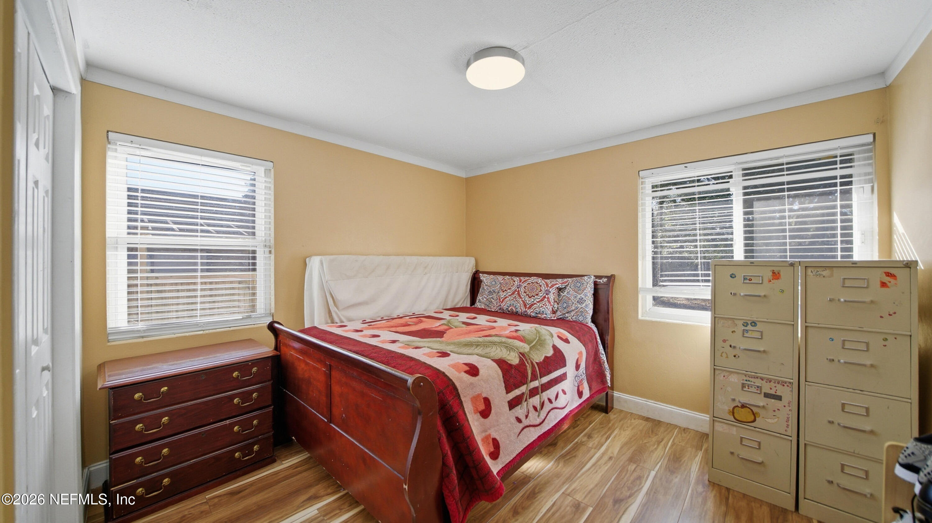2238 Ligustrum Road Jacksonville, FL 32211 - Photo 23 of 31 a bedroom with a bed and a window