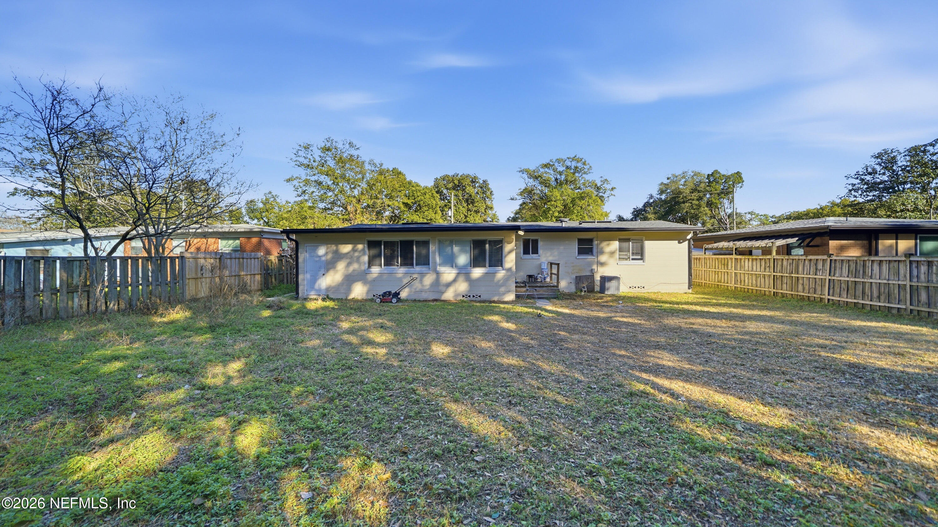 2238 Ligustrum Road Jacksonville, FL 32211 - Photo 25 of 31 a view of a house with a yard