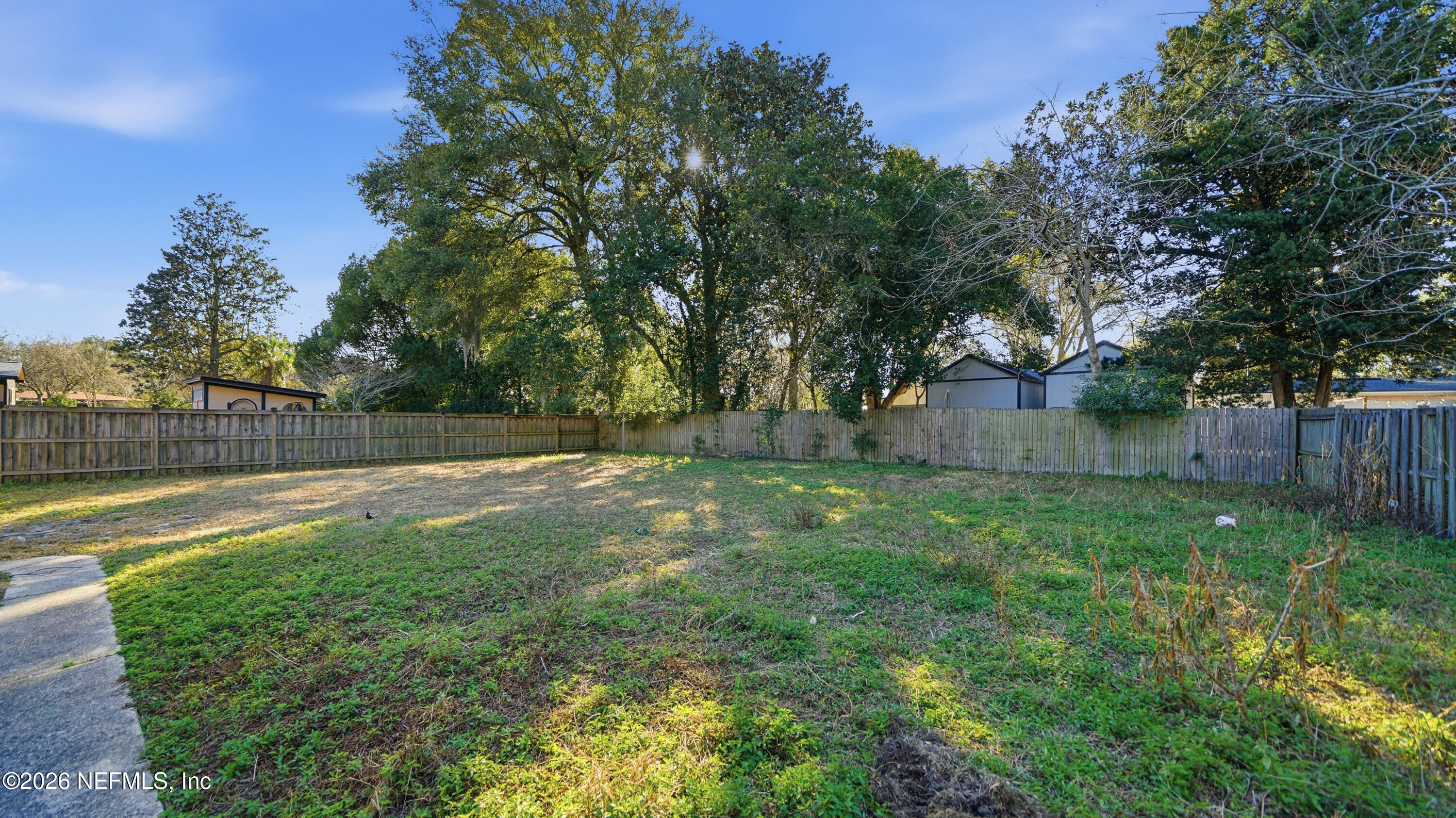 2238 Ligustrum Road Jacksonville, FL 32211 - Photo 26 of 31 a view of outdoor space with deck and green space