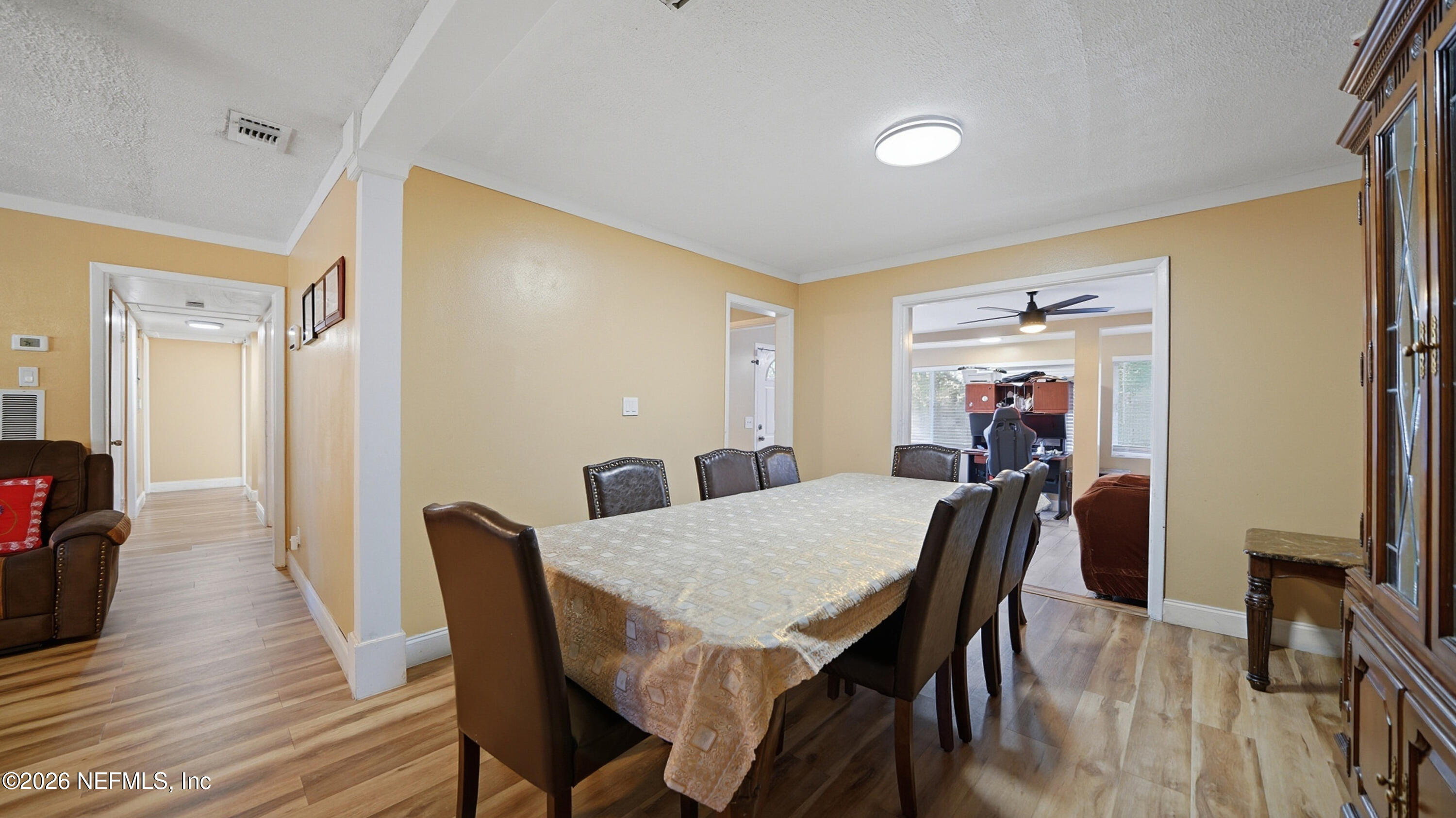 2238 Ligustrum Road Jacksonville, FL 32211 - Photo 4 of 31 a view of a dining room with furniture and wooden floor