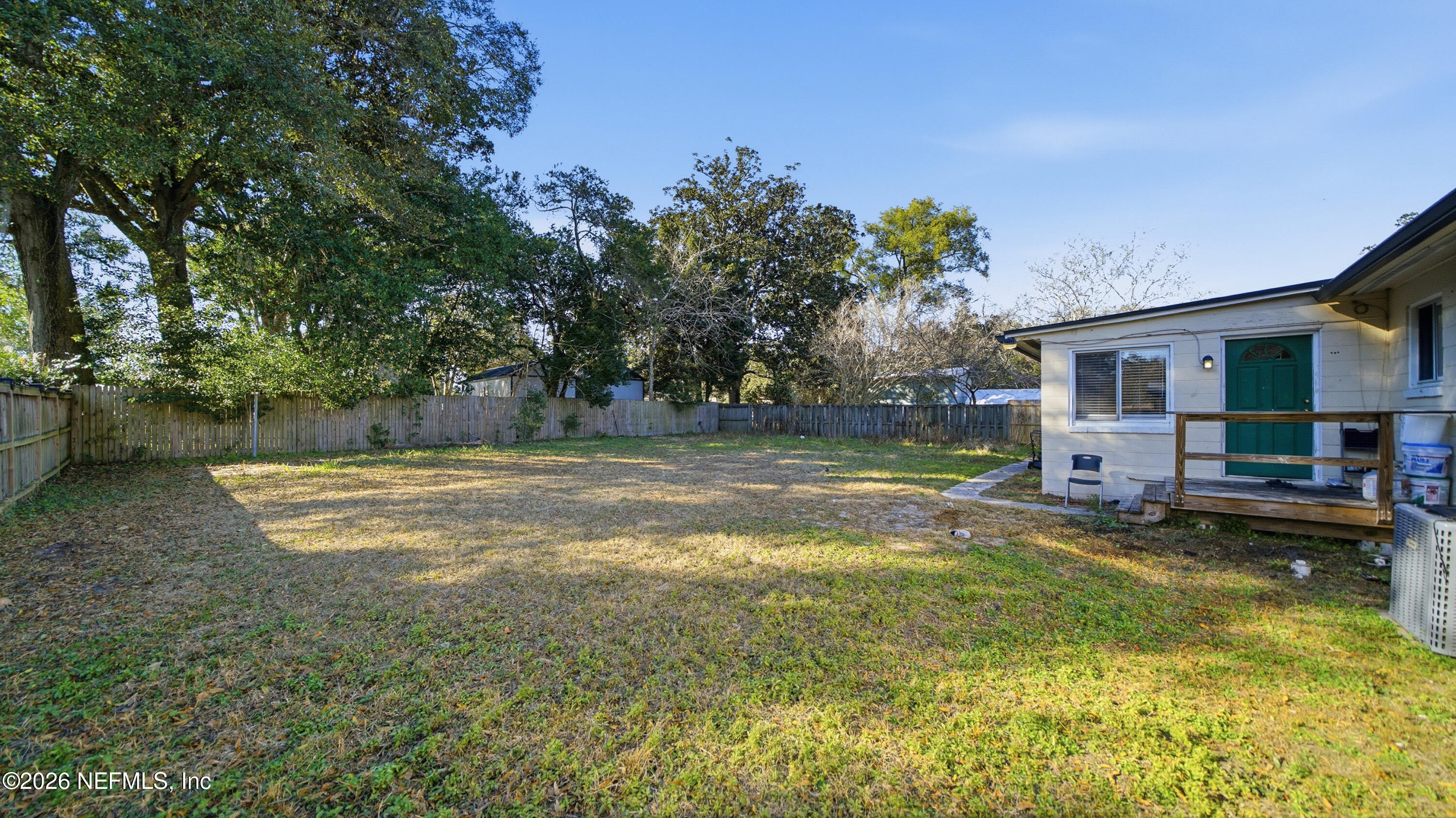 2238 Ligustrum Road Jacksonville, FL 32211 - Photo 8 of 31 a view of a house with swimming pool and a yard
