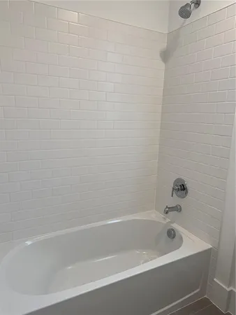 an empty room with closet area