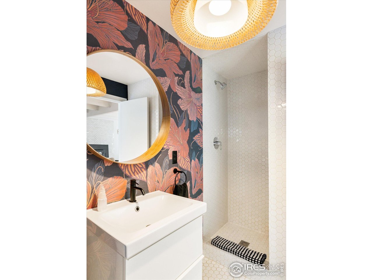 781 Cold Springs Road Boulder, CO 80302 - Photo 13 of 36 a bathroom with a sink and mirror