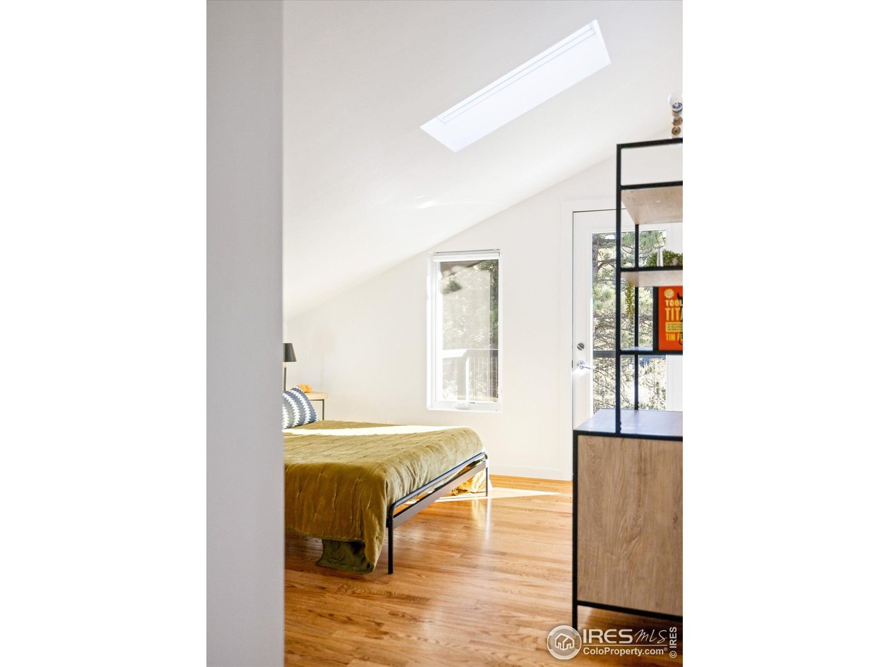 781 Cold Springs Road Boulder, CO 80302 - Photo 14 of 36 a living room with furniture and wooden floor