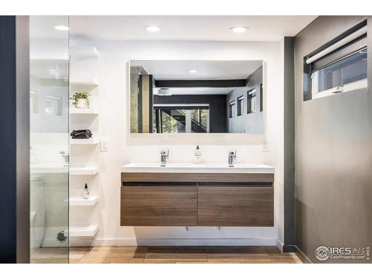 781 Cold Springs Road Boulder, CO 80302 - Photo 24 of 36 a bathroom with a sink and a mirror