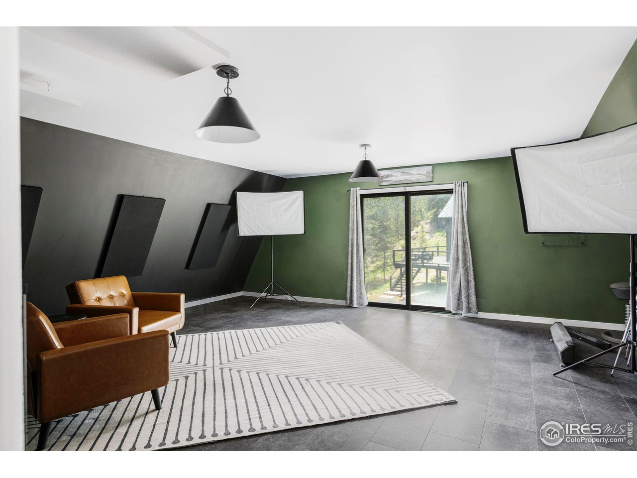 781 Cold Springs Road Boulder, CO 80302 - Photo 30 of 36 a bedroom with a bed and mirror