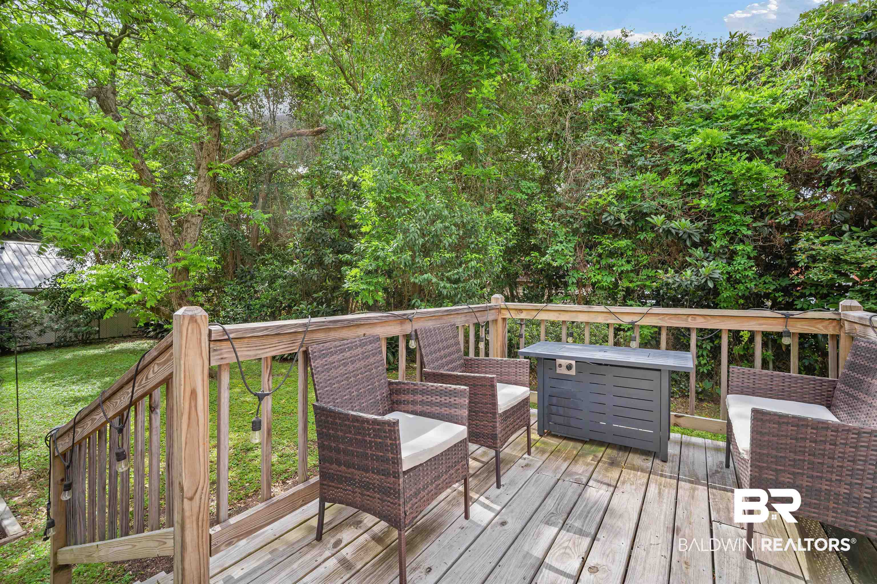 103 Emogene Place Mobile, AL 36606 - Photo 28 of 32 Wooden terrace featuring a yard
