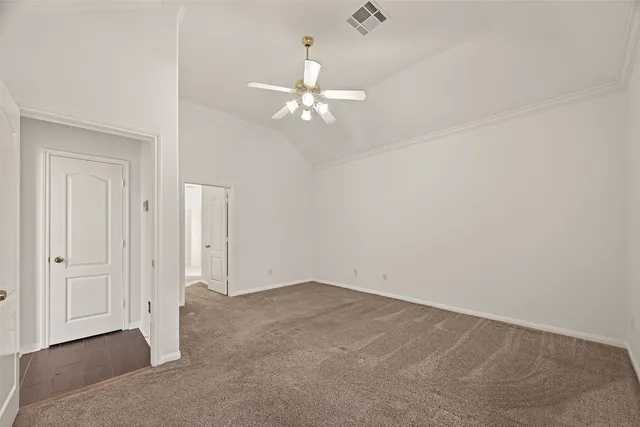 a view of a hallway with stairs