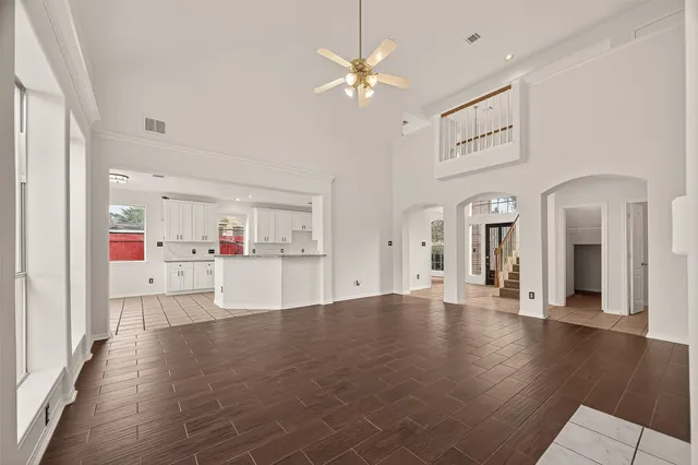 a kitchen with stainless steel appliances granite countertop a sink and cabinets