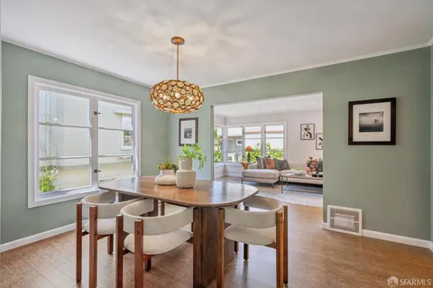 a view of a vase of flowers sitting on a table