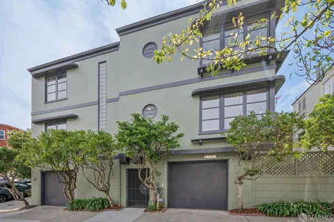 a house with a clock on it