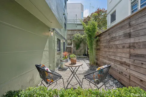 a view of a building with a glass door