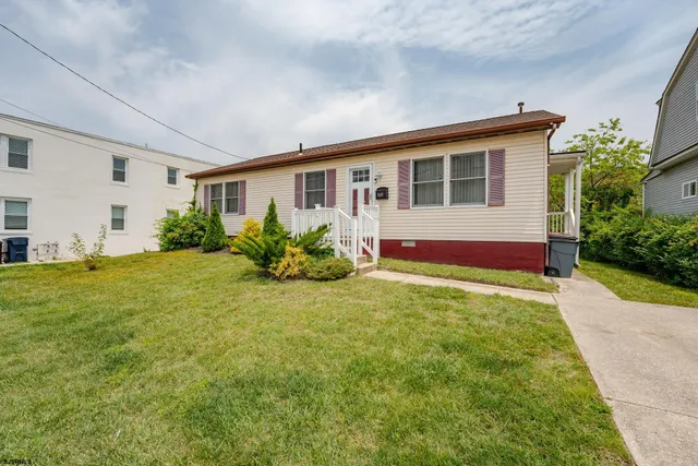 a house view with a backyard space