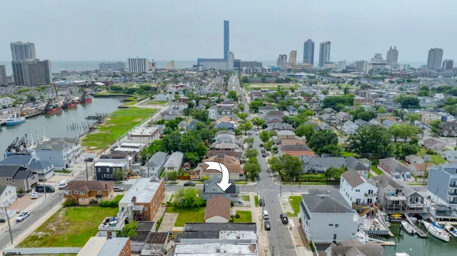 an aerial view of a house with outdoor space