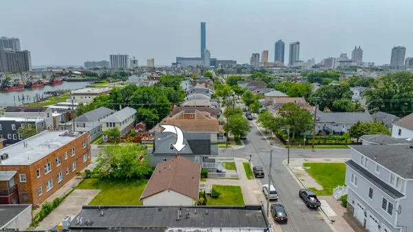 an aerial view of a house with a garden
