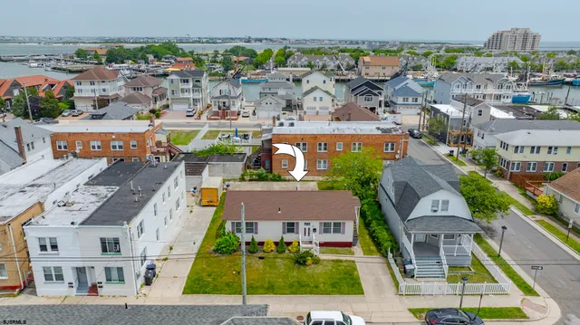 an aerial view of a city with lots of residential buildings