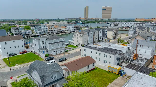 aerial view of a house with a yard