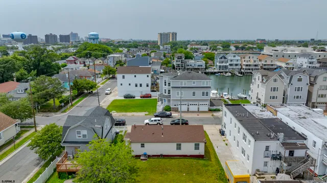 an aerial view of a house with a garden and plants