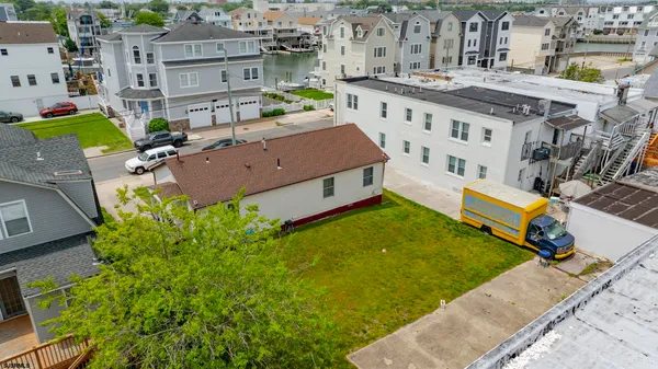 an aerial view of a house with outdoor space