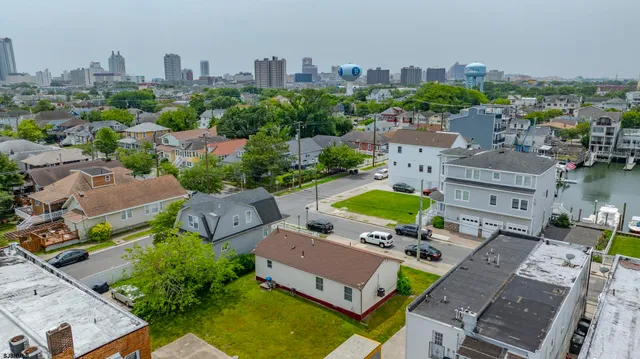 an aerial view of a house with a garden