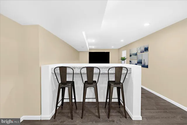 a bathroom with a sink and mirror