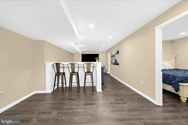 a view of room with furniture and a ceiling fan