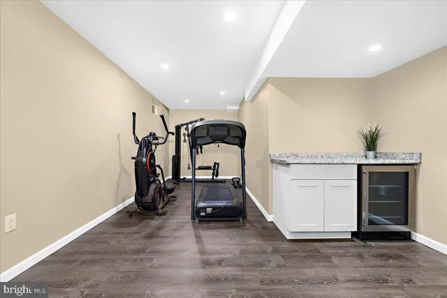 a view of a deck with table and chairs and wooden floor