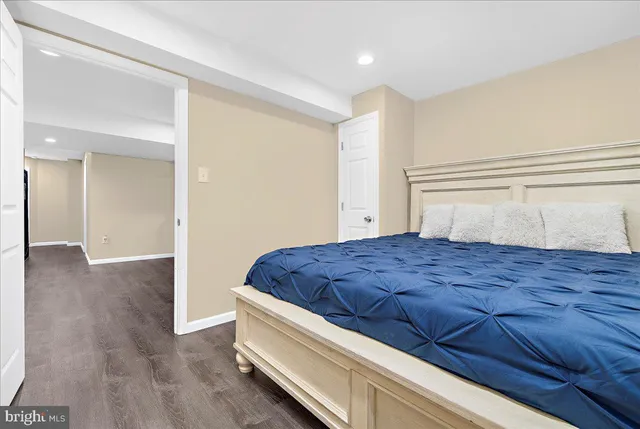 an aerial view of residential house with outdoor space and trees