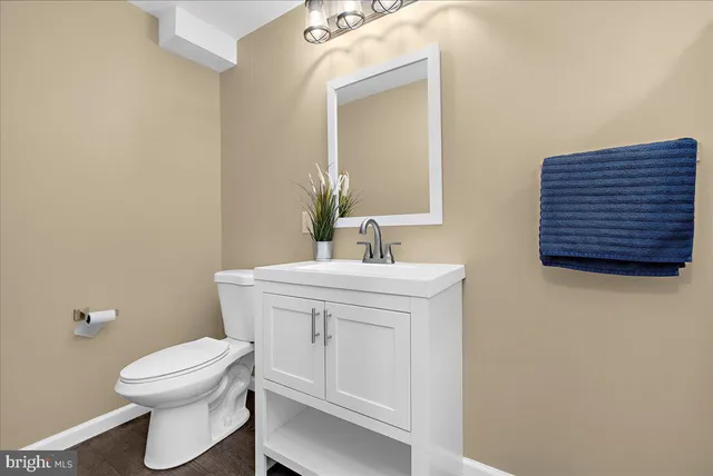 an aerial view of residential house with pool and garden