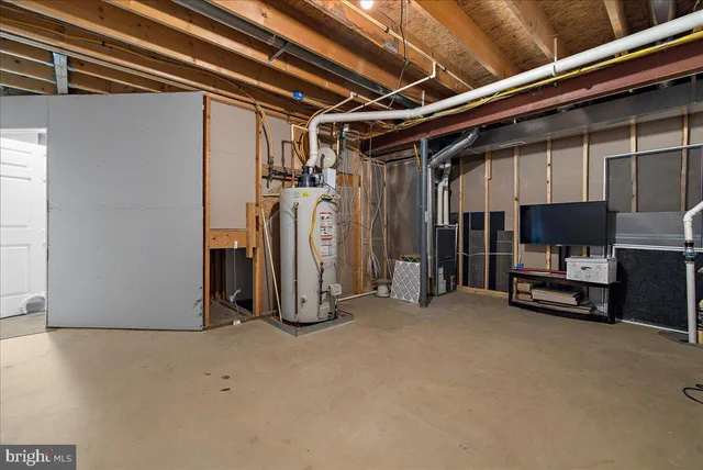 aerial view of a house with pool yard and outdoor seating