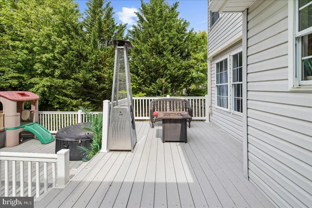 a view of an house with backyard space and garden