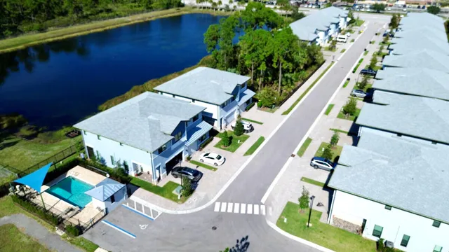 a view of a lake with a building in the background