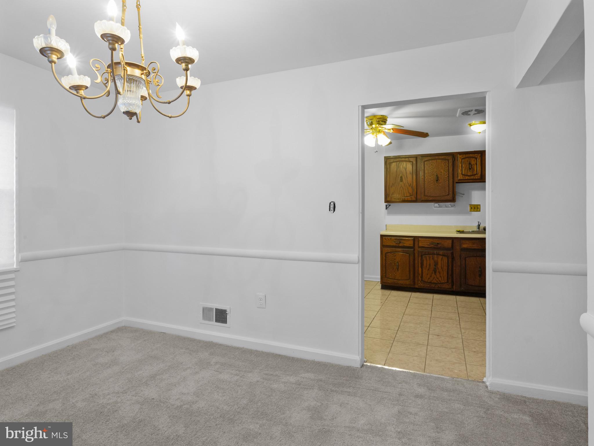 4008 24th Place Temple Hills, MD 20748 - Photo 12 of 31 a bathroom with a sink and a mirror