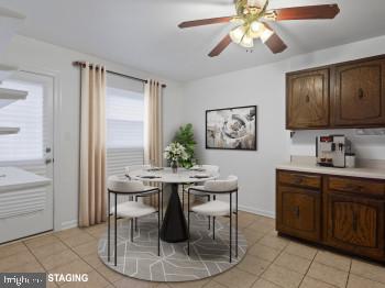 4008 24th Place Temple Hills, MD 20748 - Photo 14 of 31 a view of a dining room with furniture