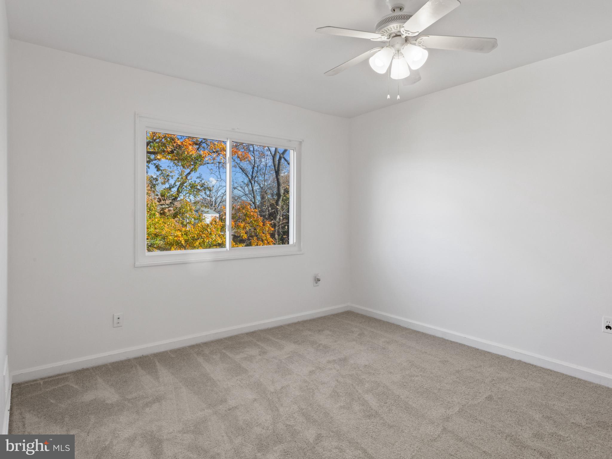 4008 24th Place Temple Hills, MD 20748 - Photo 19 of 31 an empty room with a window