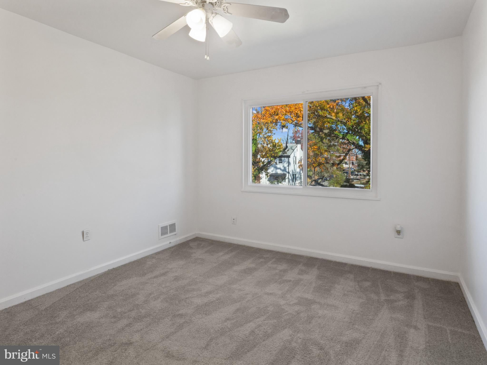 4008 24th Place Temple Hills, MD 20748 - Photo 22 of 31 an empty room with a window