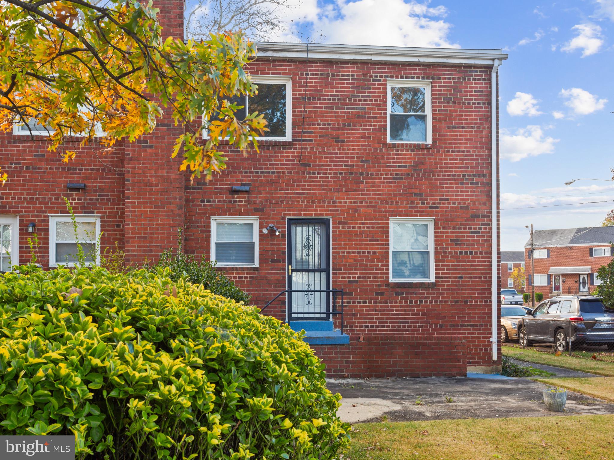 4008 24th Place Temple Hills, MD 20748 - Photo 29 of 31 a front view of a house with a yard
