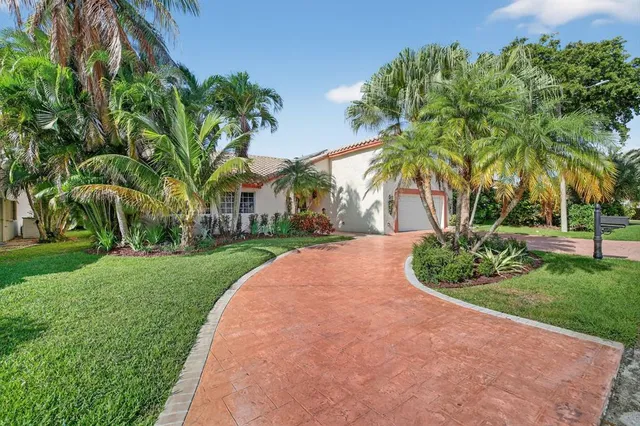 $725,000 | 7409 Corkwood Terrace, Tamarac, FL 33321