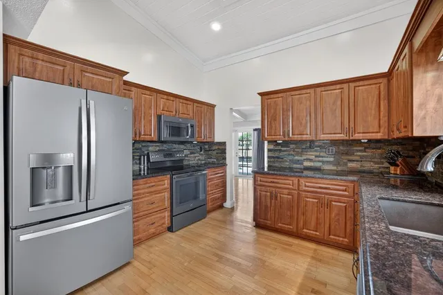 $725,000 | 7409 Corkwood Terrace, Tamarac, FL 33321