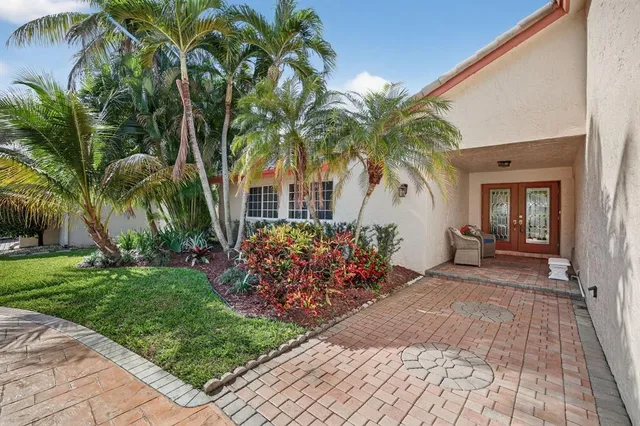 $725,000 | 7409 Corkwood Terrace, Tamarac, FL 33321