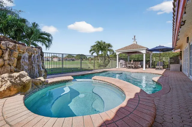 $725,000 | 7409 Corkwood Terrace, Tamarac, FL 33321