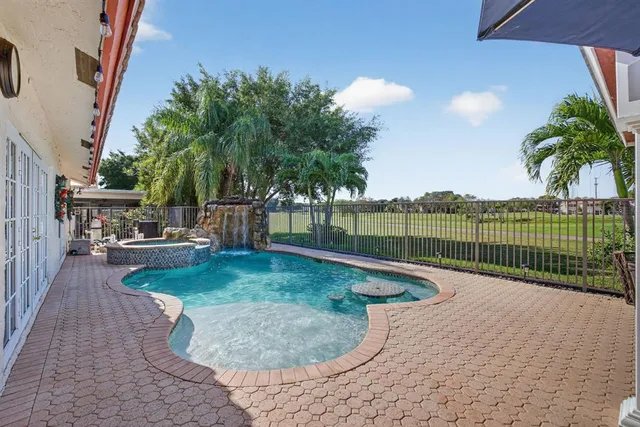 $725,000 | 7409 Corkwood Terrace, Tamarac, FL 33321