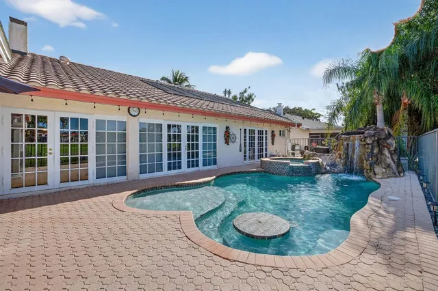 $725,000 | 7409 Corkwood Terrace, Tamarac, FL 33321