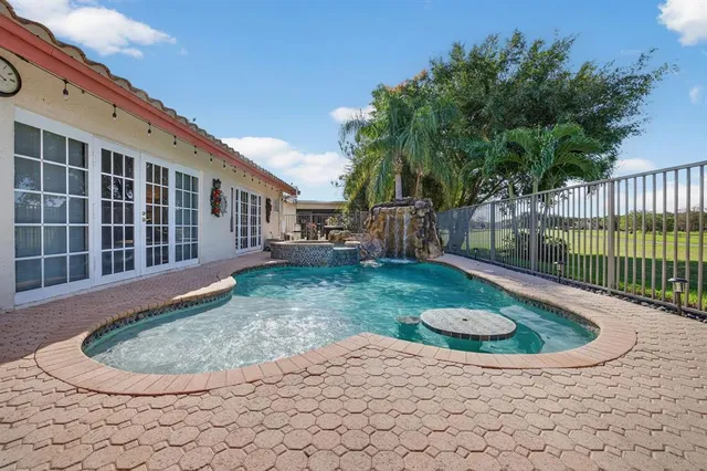 $725,000 | 7409 Corkwood Terrace, Tamarac, FL 33321