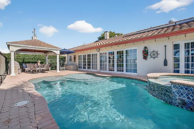 $725,000 | 7409 Corkwood Terrace, Tamarac, FL 33321