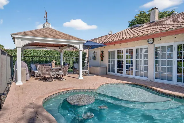 $725,000 | 7409 Corkwood Terrace, Tamarac, FL 33321