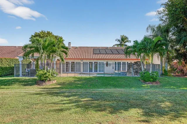 $725,000 | 7409 Corkwood Terrace, Tamarac, FL 33321