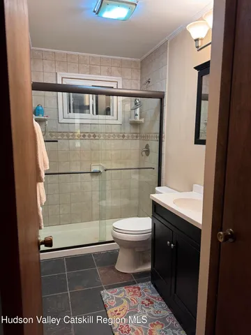 a kitchen with a table chairs and a dining table