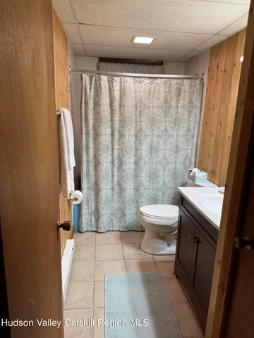 a view of a storage & utility room with dryer and washer
