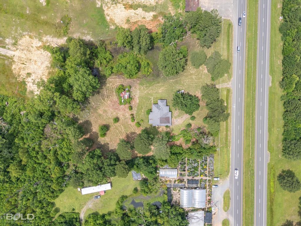 12274 Mansfield Road Keithville, LA 71047 - Photo 11 of 11 a view of backyard with green space
